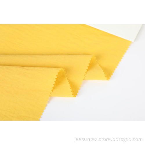 Poly och Rayon Stripe Fabric